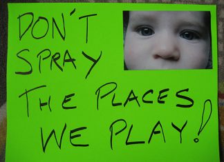 A protest sign against pesticide spraying from a San Francisco march in 2008. Photo: Kevin Krejci, Flickr CC.