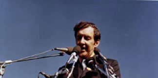 U.S. Senator Edmund Muskie, author of the 1970 Clean Air Act, addressing an estimated 40,000-60,000 people as keynote speaker for Earth Day in Fairmount Park, Philadelphia on April 22, 1970. The image on the podium was the official logo of the first Earth Week. Photo: Wikimedia, CC.