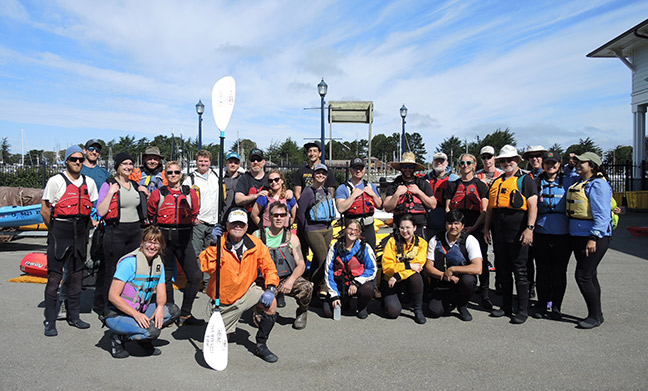 Baykeeper’s Tours Coordinator, Jasmin Segura (front left) with Coastal Cleanup Day volunteers at the Humboldt Bay Aquatic Center Photos: Jen Kalt.